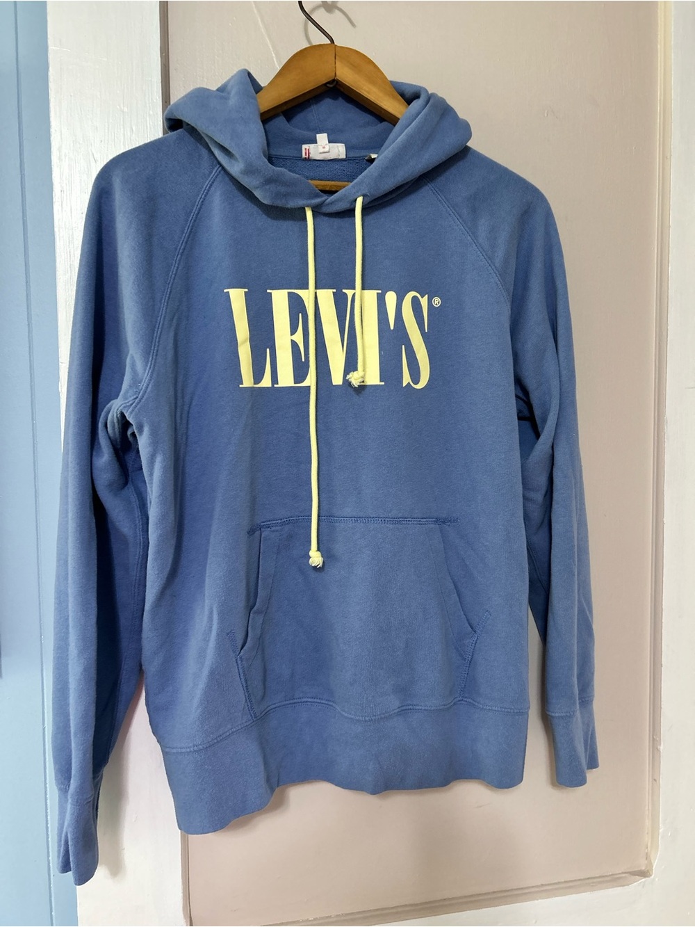 Levi's Blue Hoodie with Pale Yellow Logo